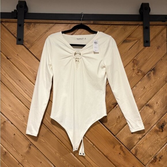 Abercrombie & Fitch Tops - 🆕 Abercrombie & Fitch Cream Tie Front Long Sleeve Bodysuit